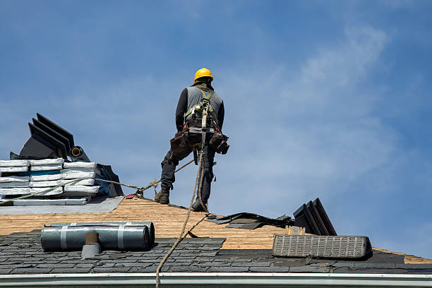 Professional Gutter Installation technician working in Wells, ME
